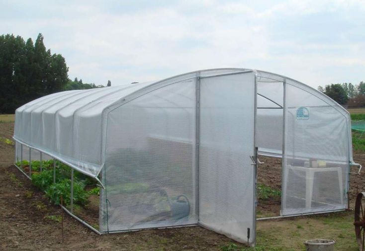 Serre tunnel Tonneau en polyéthylène 36 m² - 4 Saisons Plus 9 x 4 m - 1 porte