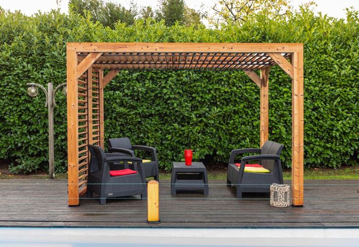 Pergola bioclimatique bois traité autoportée lames orientables 7 m²