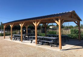 Carport 4 voitures en bois Douglas 10 poteaux couverture acier galvanisé CPBF